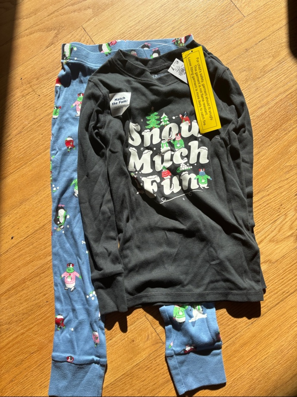 Kids Black 'Snow Much Fun' Long-Sleeve Pajama Top and Blue Penguin Pants Set